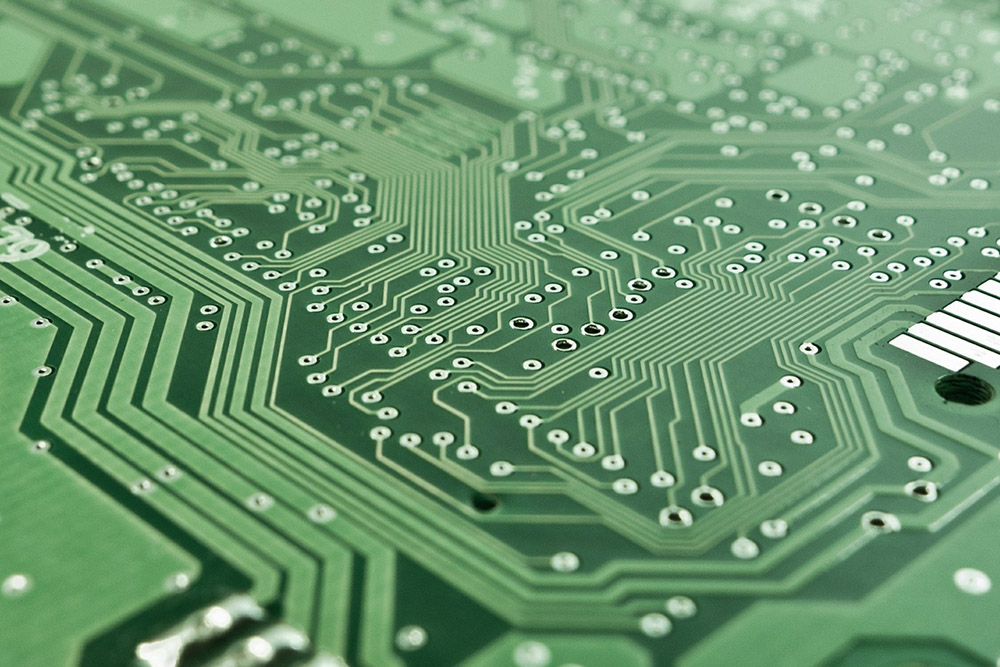 Printed circuit boards can be coated with phosphor inks to detect temperature hot spots.