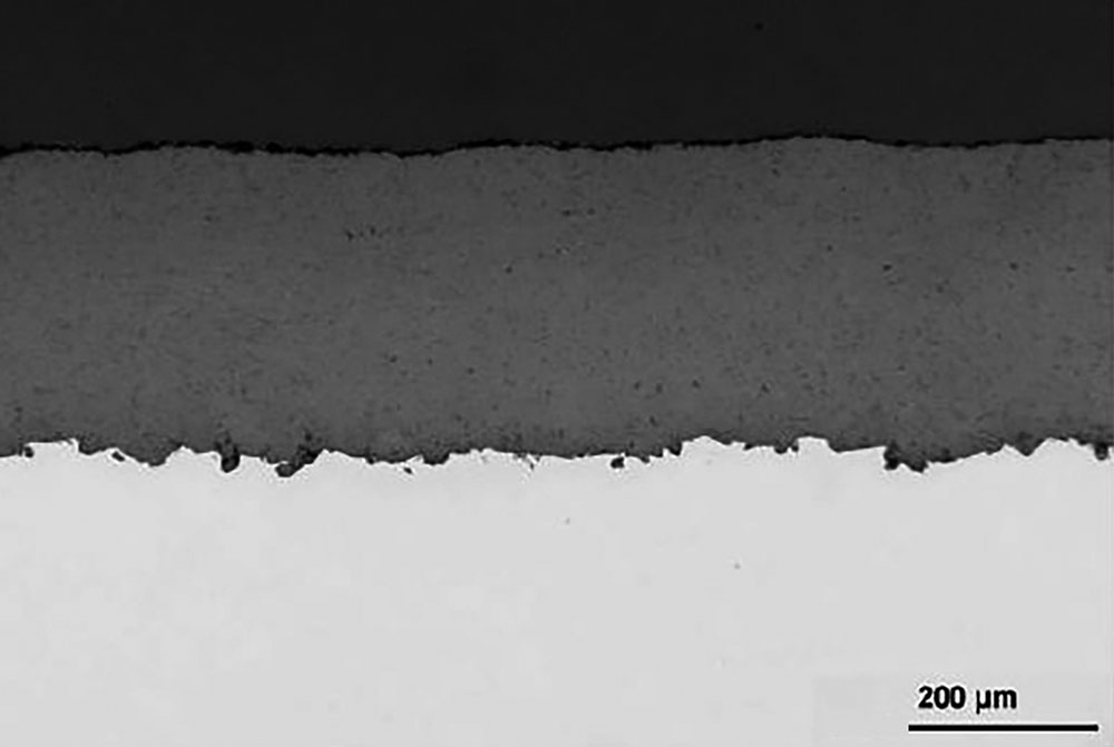 SEM image of an Al2O3 coating on a steel substrate, produced by thermal spraying of a suspension 